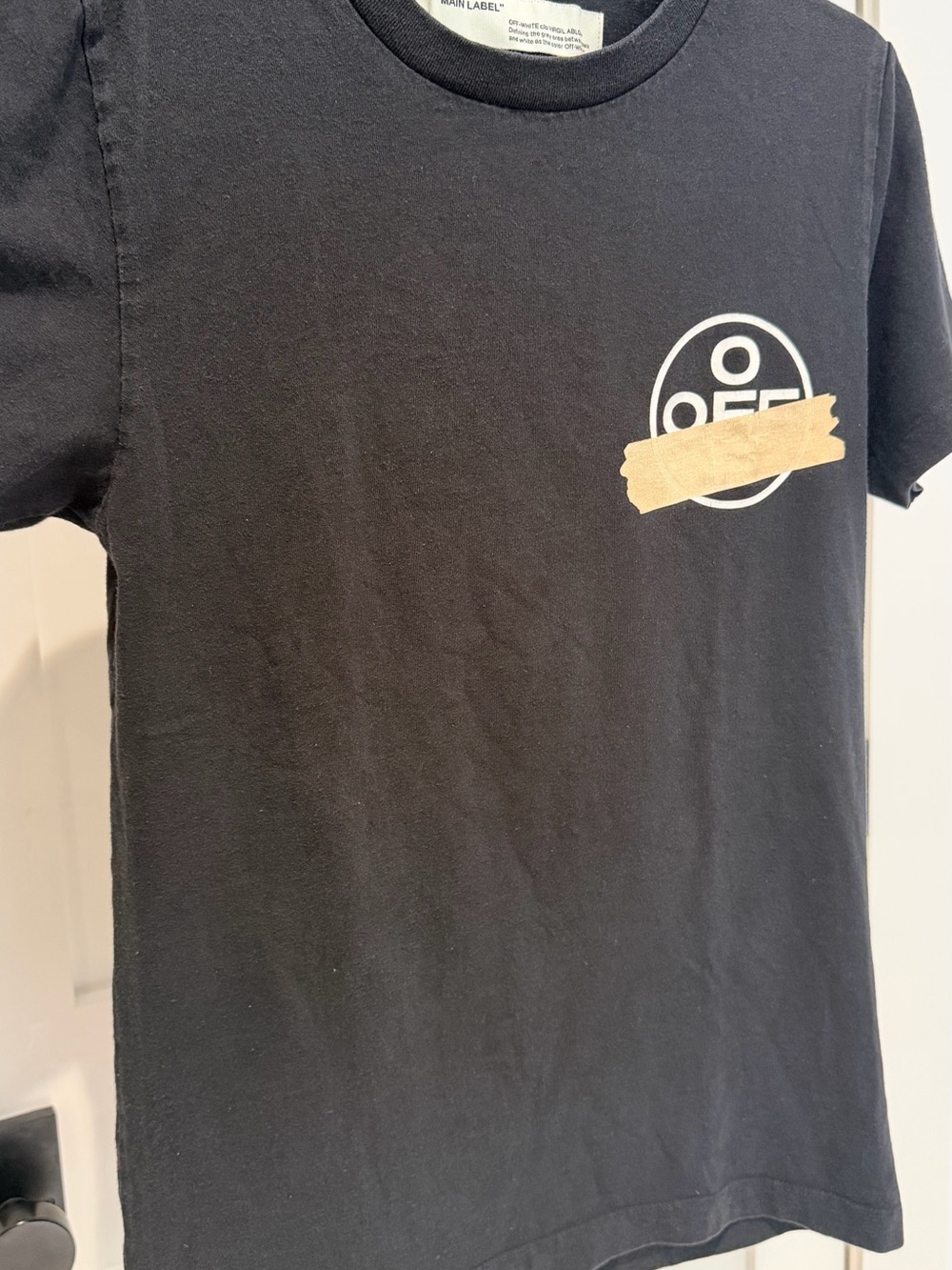 Off-White Black Crewneck Tee with Beige Tape Emblem
